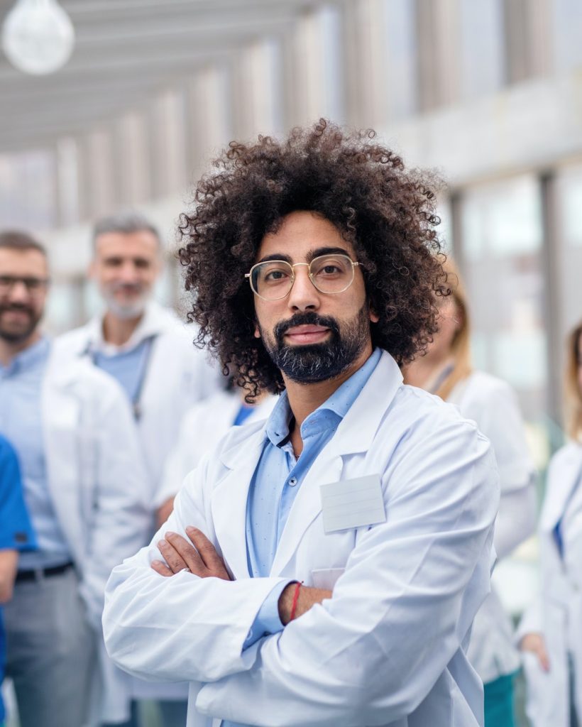 group-of-doctors-standing-in-corridor-on-medical-conference.jpg group-of-doctors-standing-in-corridor-on-medical-conference.jpg
